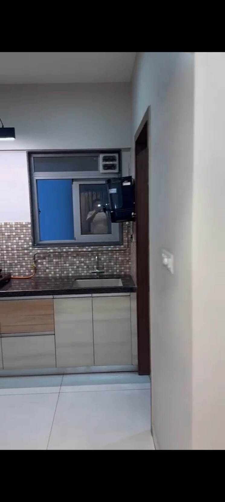 Kitchen, amanora-adreno-towers 2 Bedroom 808 Sq.Ft. Apartment In Hadapsar Pune 8880327