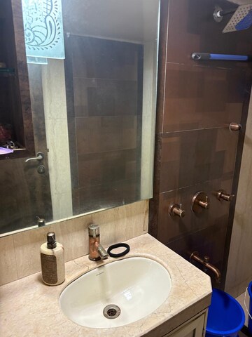 Bathroom in 2 BHK Apartment at K Raheja Palm Spring, Malad West – for Rent