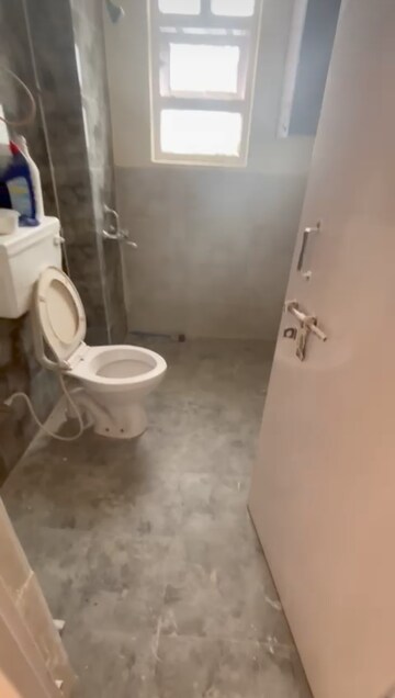 Bathroom in 1 BHK Apartment at Auric City Homes, Sector 82 – for Rent