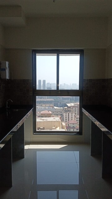 Kitchen in 2 BHK Apartment at Raj Infinia, Malad West – for Sale