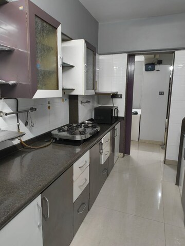 Kitchen in 2 BHK Apartment at The Wadhwa Palm Beach Residency, Nerul Sector 4 – for Rent