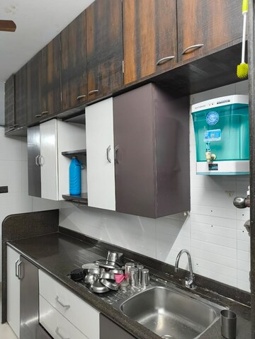 Kitchen in 2 BHK Apartment at The Wadhwa Palm Beach Residency, Nerul Sector 4 – for Rent