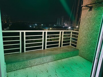 Balcony in 2 BHK Apartment at The Wadhwa Palm Beach Residency, Nerul Sector 4 – for Rent