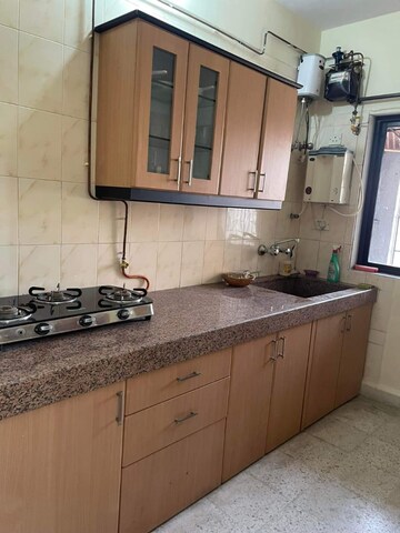 Kitchen in 2 BHK Apartment at Harbour Court, Nerul Sector 19a – for Sale