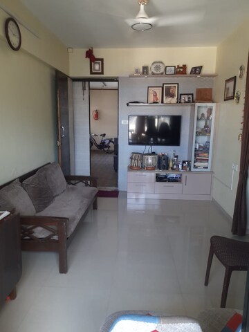 Living Room in 1.5 BHK Apartment at Ravi Kiran CHS Chembur, Chembur – for Rent