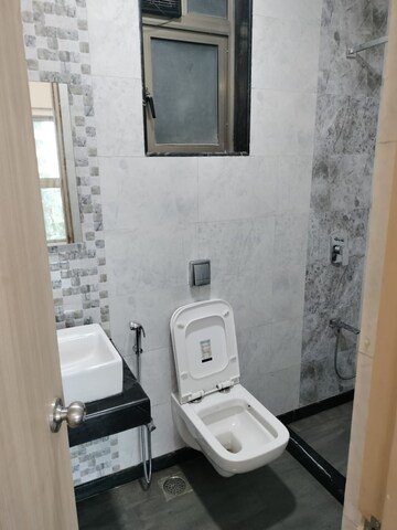 Bathroom in 2 BHK Apartment at Rajesh Raj Infinia, Malad West – for Rent