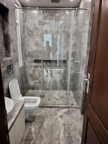Bathroom in 4 BHK Builder Floor at Green Park Extension – for Sale