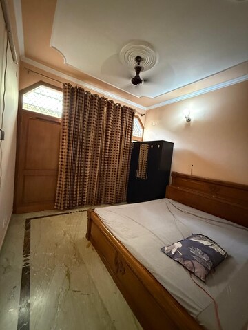 Bedroom in 2 BHK Builder Floor at Kalkaji – for Rent
