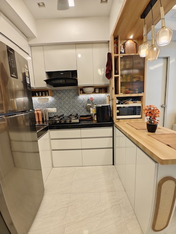 Kitchen in 2 BHK Apartment at Lodha Crown Quality Homes, Majiwada – for Sale