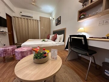 Living Room in Studio Apartment at Nimbus The Golden Palm, Sector 168 – for Sale