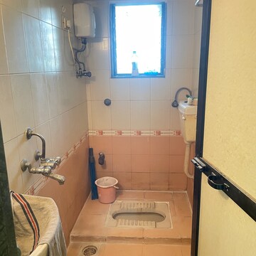 Bathroom in 1 BHK Apartment at Niramala Apartments, Siddhartha Nagar – for Rent