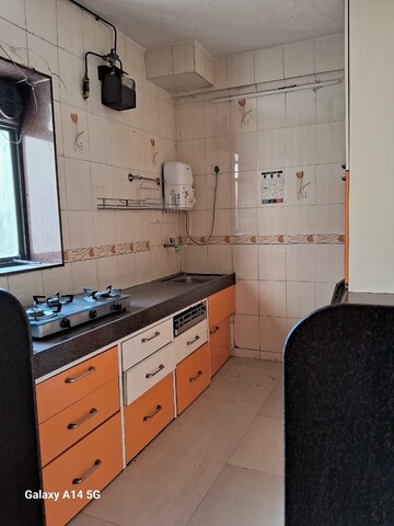 Kitchen in 2 BHK Apartment at Atul Blue Empire, Kandivali West – for Rent