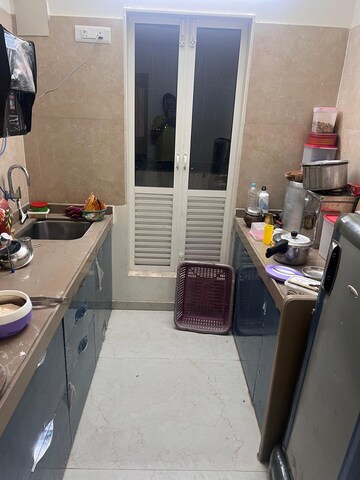 Kitchen in 1.5 BHK Apartment at Rosa Gardenia, Ghodbunder Road – for Sale