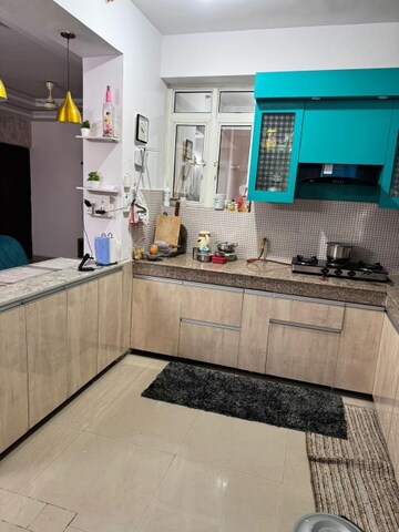 Kitchen in 3 BHK Apartment at Amrapali Dream Valley, Tech Zone 4 Greater Noida – for Rent