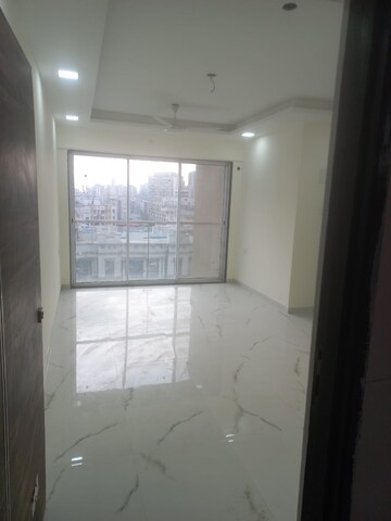 Living Room in 2 BHK Apartment at Amar Vinay Heritage, Mira Road – for Rent