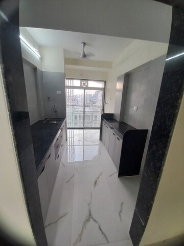 Kitchen in 2 BHK Apartment at Amar Vinay Heritage, Mira Road – for Rent