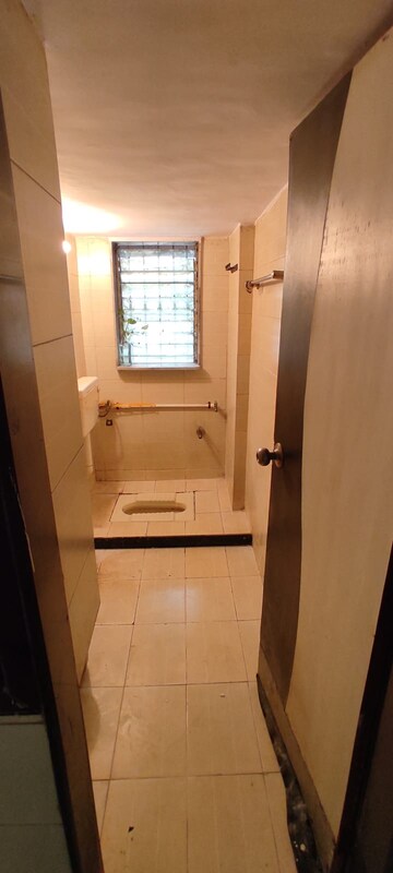 Bathroom in 2 BHK Apartment at Ankur Enclave, Mira Road – for Rent