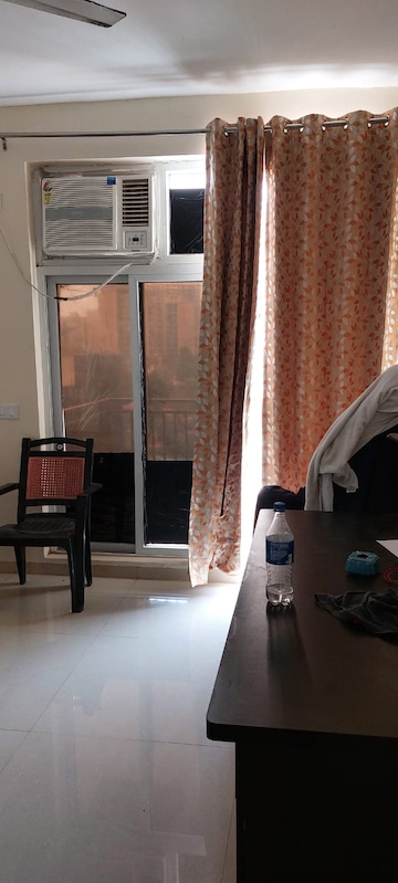 Living Room in 2 BHK Apartment at Ansal API Celebrity Gardens, Sushant Golf City – for Rent