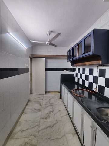 Kitchen in 1 BHK Apartment at Mangal Orchid Chs, Andheri West – for Rent