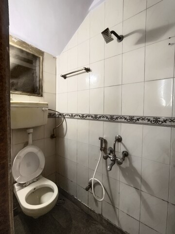 Bathroom in 1 BHK Apartment at Mangal Orchid Chs, Andheri West – for Rent