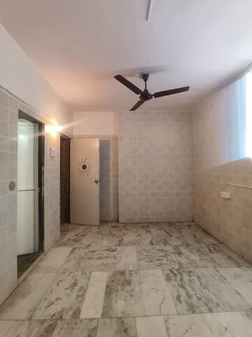 Room in 1 BHK Apartment at Mangal Orchid Chs, Andheri West – for Rent