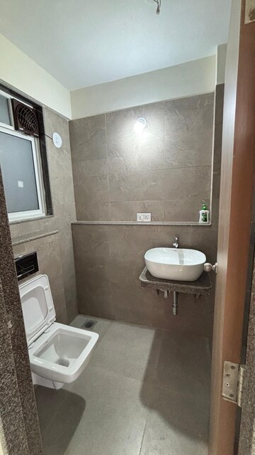 Attached Bathroom in 1 BHK Apartment at UK Iridium, Kandivali East – for Rent