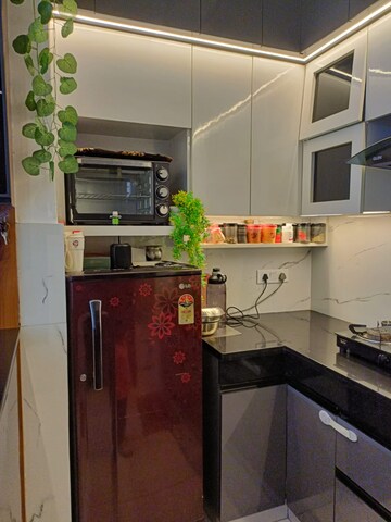 Kitchen in 4 BHK Apartment at DLF Hamilton Court, Sector 27 – for Sale