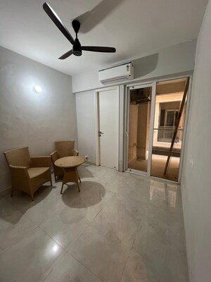 Living Room in 4 BHK Apartment at DLF Hamilton Court, Sector 27 – for Sale