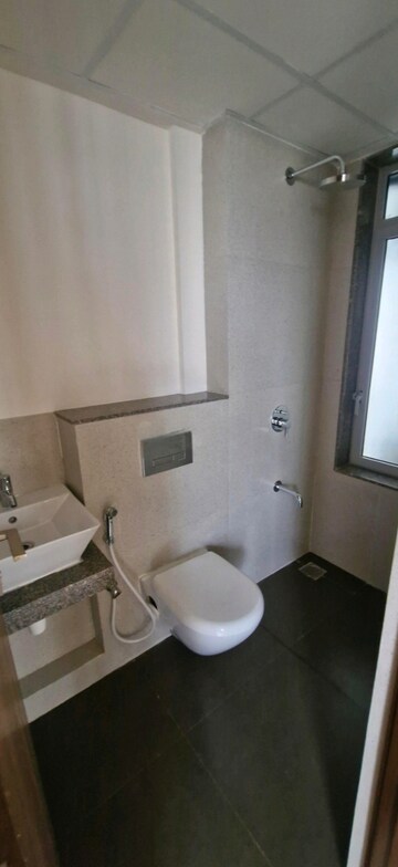 Bathroom in 2 BHK Apartment at Piramal Vaikunth, Balkum Pada – for Rent