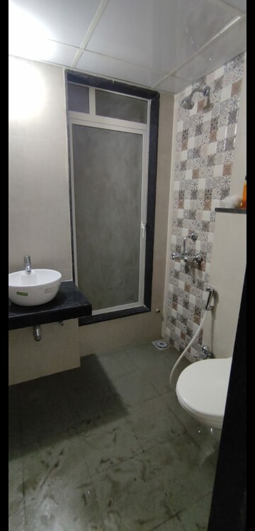 Bathroom in 1 BHK Apartment at Omkar Signet, Malad East – for Rent