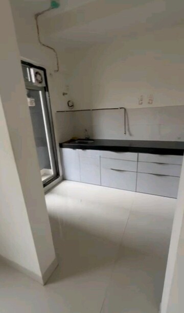 Kitchen in 2 BHK Apartment at Ashar Metro Towers, Vartak Nagar – for Rent
