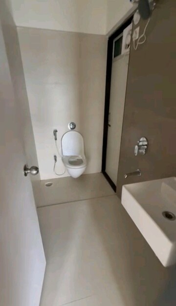 Bathroom in 2 BHK Apartment at Ashar Metro Towers, Vartak Nagar – for Rent