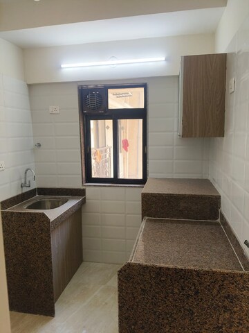 Kitchen in 1.5 BHK Apartment at Chandiwala Pearl Regency, Andheri West – for Rent