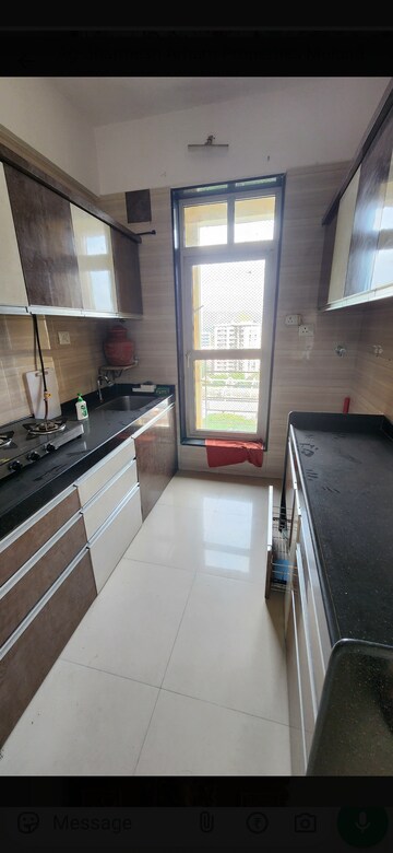 Kitchen in 3 BHK Apartment at Sheth Vasant Lawns, Laxmi Nagar – for Rent