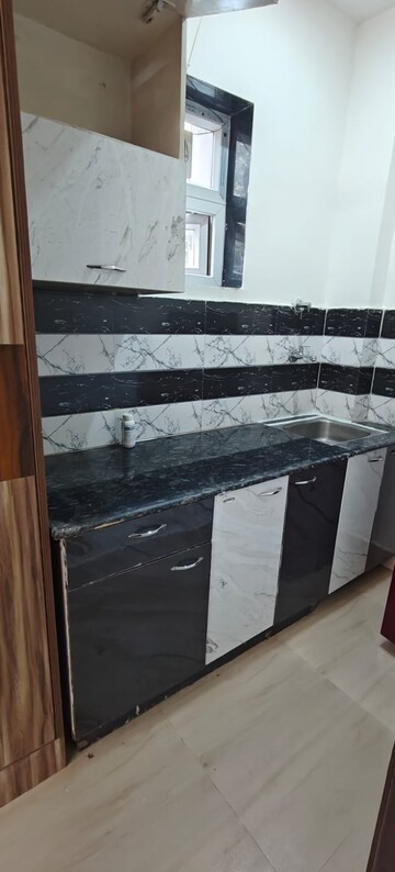 Kitchen in 1 RK Builder Floor at Sushant Lok I – for Rent