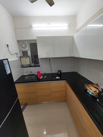 Kitchen in 2 BHK Apartment at Omkar Signet, Malad East – for Rent