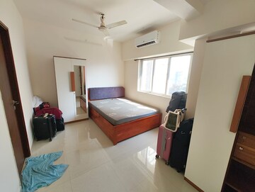 Living Room in 2 BHK Apartment at Omkar Signet, Malad East – for Rent