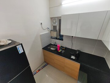 Kitchen in 2 BHK Apartment at Omkar Signet, Malad East – for Rent