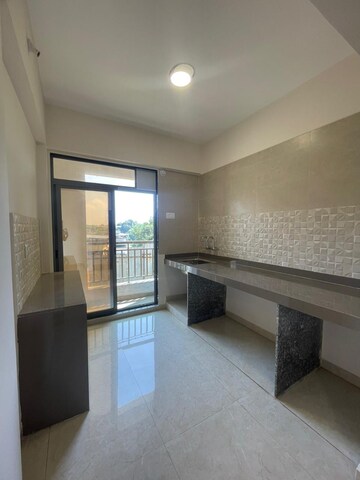 Kitchen in 1 BHK Apartment at Mohan Alcoves, Badlapur West – for Sale