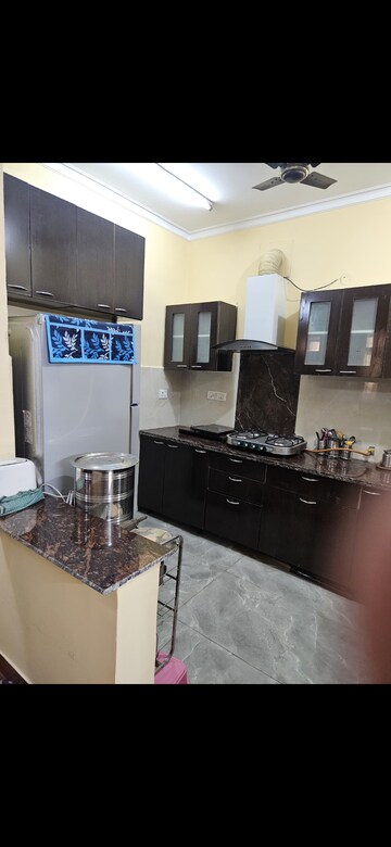 Kitchen in 2 BHK Apartment at Jaipuria Sunrise Green, Lohgarh – for Rent