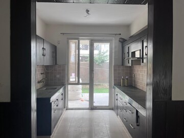 Kitchen in 3 BHK Apartment at Puri Vip Floors, Sector 81 – for Sale