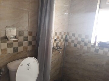 Bathroom in 2.5 BHK Apartment at Paras Tierea, Sector 137 – for Sale
