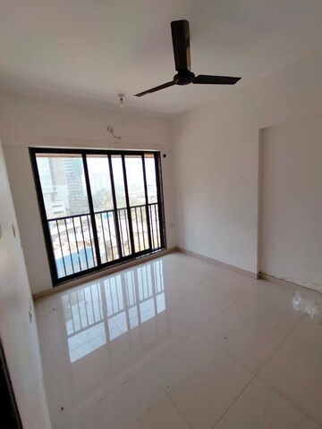 Living Room in 1 BHK Apartment at Parinee Essence, Kandivali West – for Rent