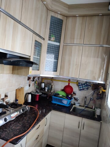 Kitchen in 2 BHK Apartment at Mahagun Mywoods, Sector 16c Greater Noida – for Rent