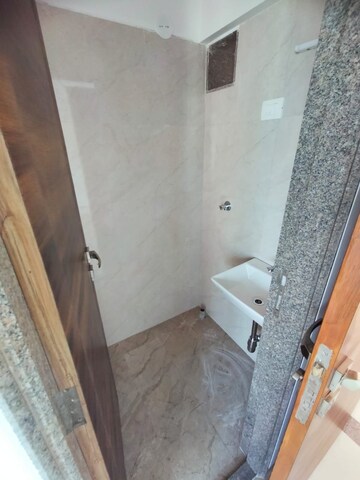 Bathroom in 1 BHK Apartment at Dimple 19 North, Kandivali West – for Rent