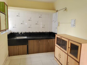 Kitchen in 2 BHK Apartment at Spring Glory Co-Operative Society, Kharadi – for Rent