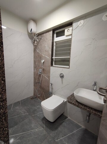 Bathroom in 2 BHK Apartment at Sri Zynergy, Suman Nagar – for Rent