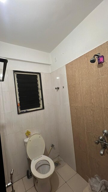Bathroom in 2 BHK Apartment at Treasure Society, Pimple Gurav – for Rent