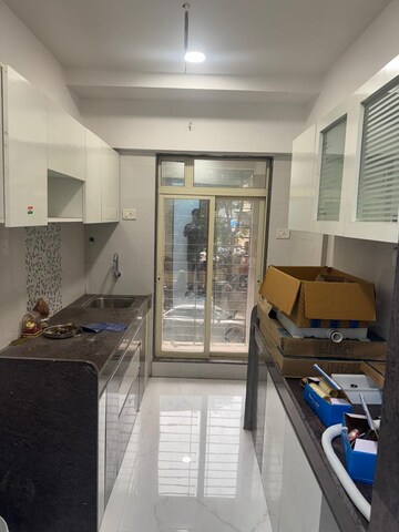 Kitchen in 3 BHK Apartment at RNA NG Valencia, Mira Road – for Rent