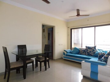 Living Room in 1 BHK Apartment at Aman Spring, Kandivali West – for Rent